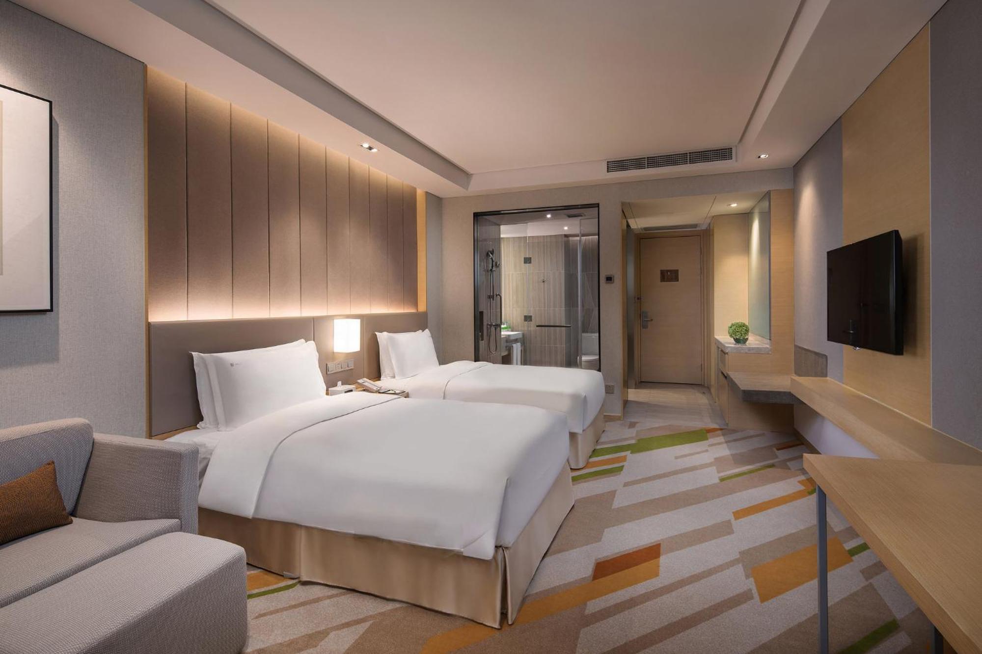 Holiday Inn Wuxi Taihu New City By Ihg Bagian luar foto