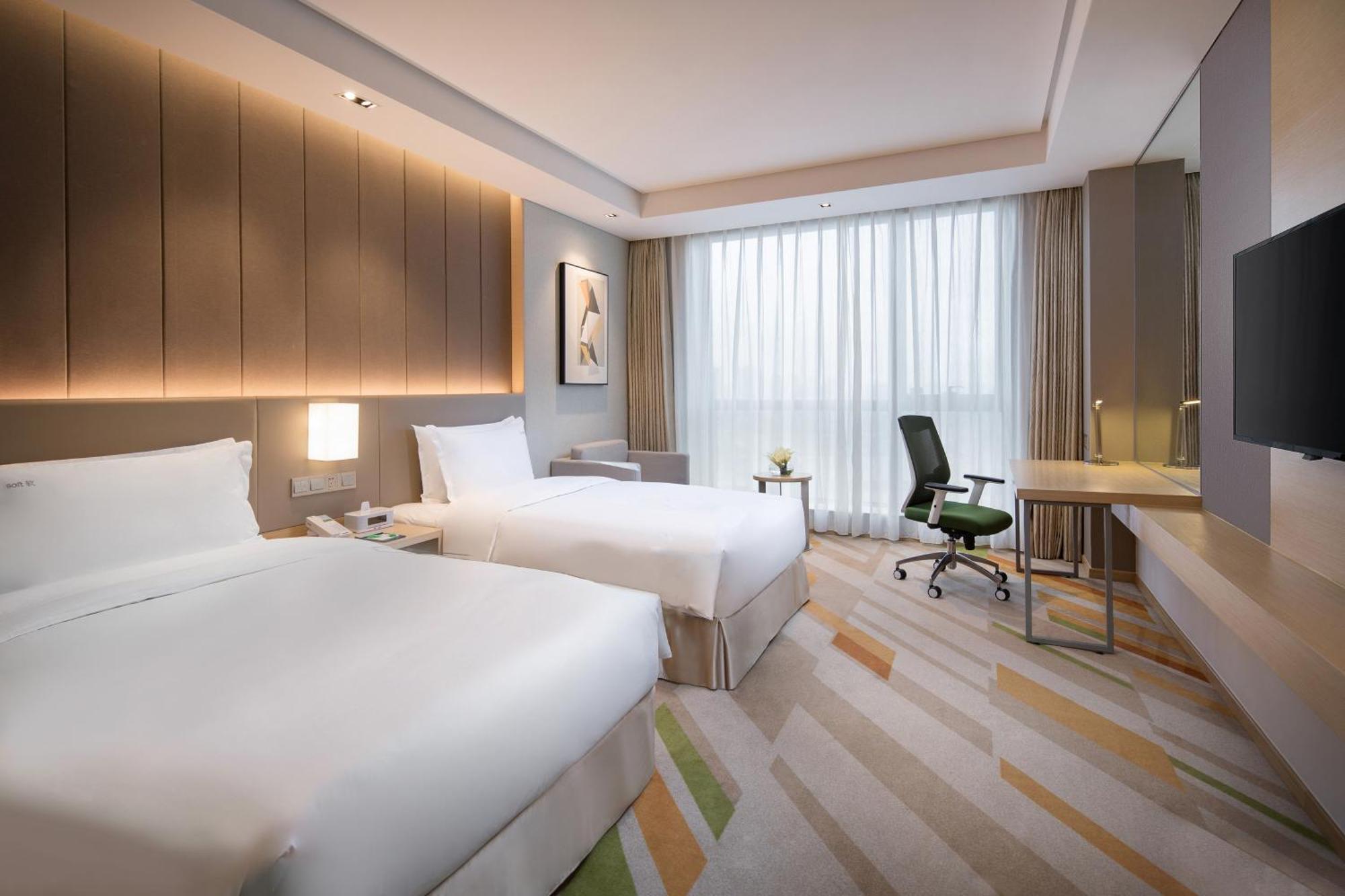 Holiday Inn Wuxi Taihu New City By Ihg Bagian luar foto